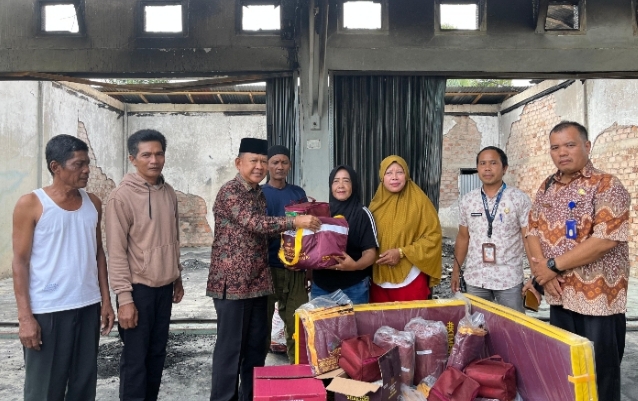 Wabup Merangin Tinjau Bengkel yang Terbakar, Bantuan Disalurkan kepada Korban