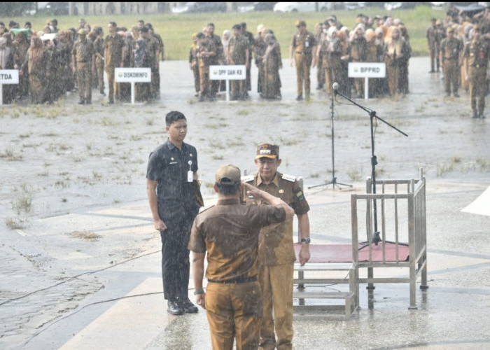 Apel di Tengah Hujan, Bupati BBS Instruksikan ASN Jalankan Program Pusat