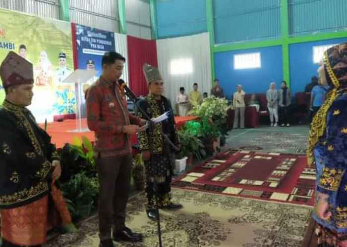 PJ Bupati Muaro Jambi Menghadiri Pengukuhan LAM Desa Suak Putat