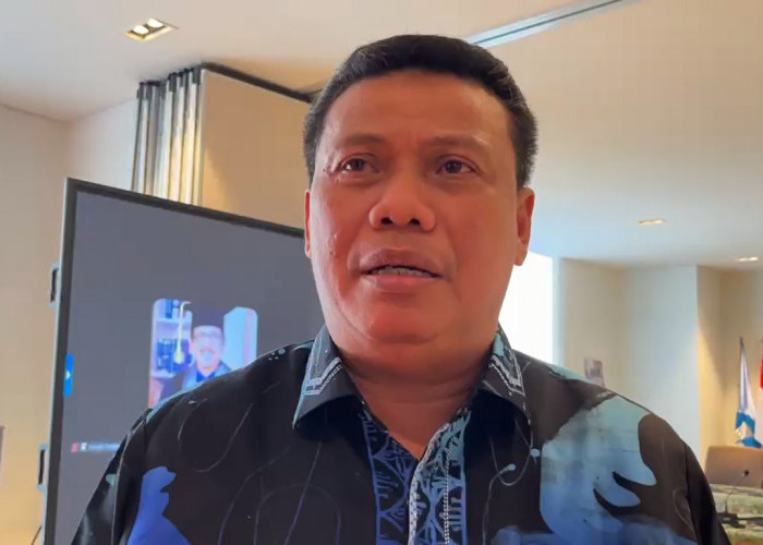 Kepala Diskoperindag Tanjab Barat Raih Gelar Doktor, Tawarkan E-Budgeting sebagai Solusi Penurunan Kemiskinan 