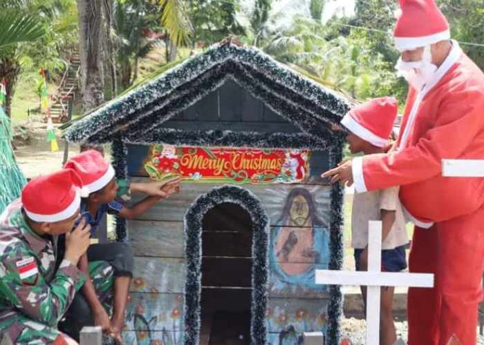 Satgas Pamtas Yonif 122/TS Ceriakan Anak-Anak Ujung Timur Papua Menyambut Hari Natal dan Pergantian Tahun