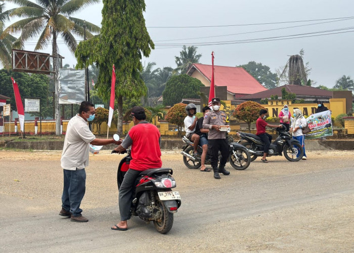 Kabut Asap Ancam Kesehatan Warga, PTPN IV Regional IV Bagikan 1.000 Masker di Tebo