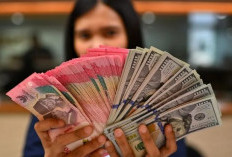 Rupiah melemah seiring sikap hati-hati terhadap arah kebijakan BI