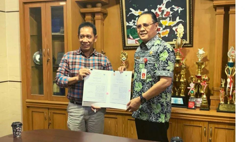 Kepala Dinas Pendidikan Provinsi Jambi Menandatangani nota MoA dengan FST Unja